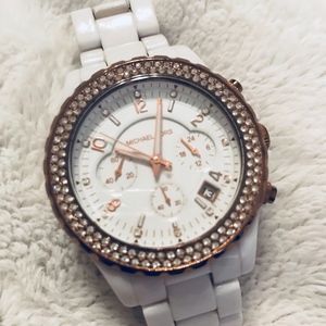 White and rose gold Michael Kors watch new battery